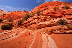 Approximately: Vermillion Cliffs - carved rock made of jurrasic-age