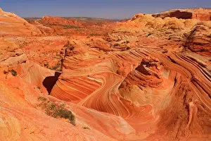 Approximately: Vermillion Cliffs - The Wave - carved rock made