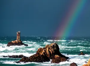 Monuments: Vielle lighthouse with a rainbow, Raz de Sein, Brittany