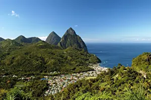 Lucia: A view of The Pitons Mountains, with dense green
