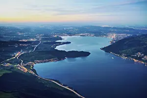 Overlook: View from Rigi Kulm to the sea of lights with Lake Zug and the Kiemen