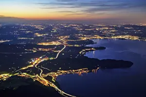 Roads: View from Rigi Kulm to the sea of lights with the motorway