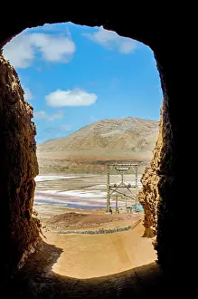 Steep: View through rock to salina at sandbeach. Sal. P