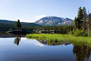 Passes: View of smooth-surfaced Bare Loon Lake, Chilkoot