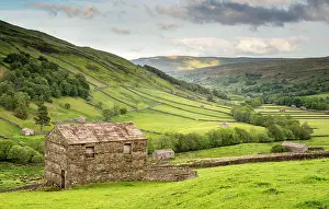 Stonewall: View of stone barns, fields and dry stone walls