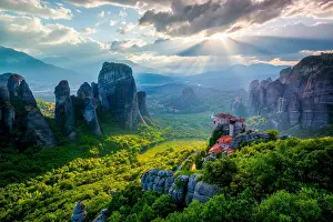 Rays: View with sunset with sun rays over the monastery