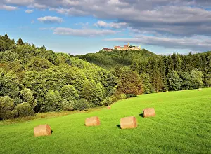 Bales: View of the Wartburg Castle, bales of hay in meadow