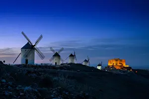Whitewashed: A view of the windmills and castle of Consuegra