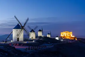Whitewashed: A view of the windmills and castle of Consuegra