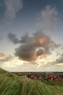 Township: Viewpoint from beach ridge with marram on village with houses