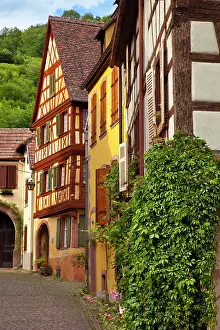 Alsatian: Village street scene in Kaysersberg, along