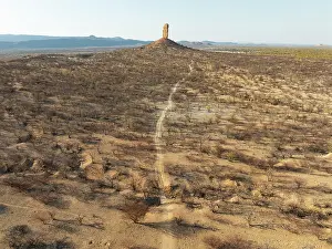 Track: The Vingerklip (rock finger) is surrounded by thornbush and mopane (Colophospermum mopane) savanna