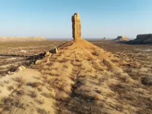 Eroded: The Vingerklip (rock finger) and the Ugab Valley Terraces are surrounded by thornbush and mopane (Colophospermum mopane)