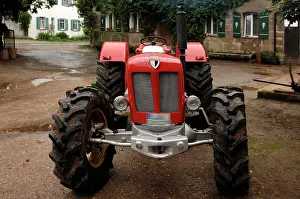 Built: Vintage Schlueter tractor on a farm, 6 cylinders