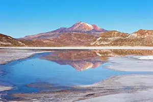 Salar: Volcano Cerro Tunupa with reflection in the Salar