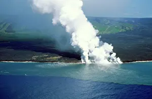 Entering: Volcano - Larva flowing from Kilauea and entering the sea