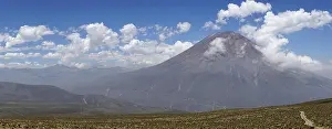 Salinas: Volcano Misti with clouds, Salinas and Aguada Blanca