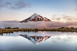 Egmont: Water reflection in Pouakai Tarn Mountain Lake at