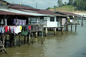 Raised: Water Village Walkway and shacks on stilts with
