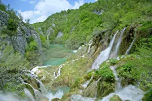 Cascading: Waterfall - cascading down steep cliffs in lower