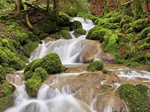 Waterfalls: Waterfall with moss-covered rocks