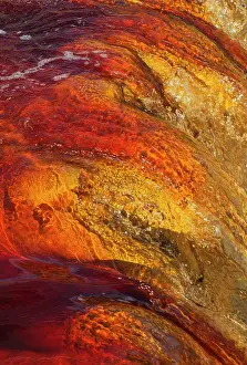 Oxidised: Detail of a waterfall in the Rio Tinto Red river wit