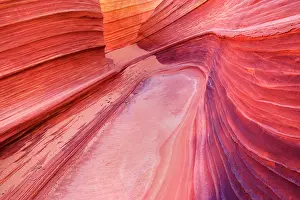 Approximately: The Wave - carved rock eroded into a wave-like