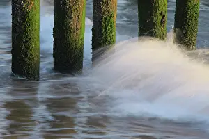 Crashing: Wave crashing against breakwaters at the Dutch coast