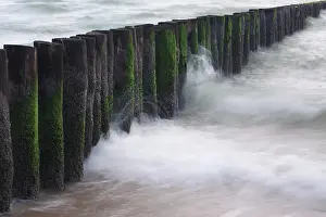Crashing: Waves crashing into breakwaters at the Dutch coast