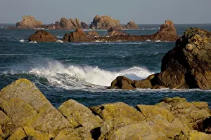 Crashing: Waves crashing against rocky coastline