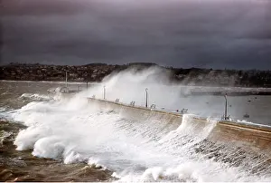 Harbours: WAVES - lash coast in Force 9 gale. Haldon pier