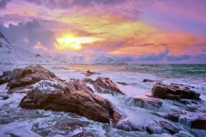 Waves: Waves of Norwegian sea on rocky coast in fjord on