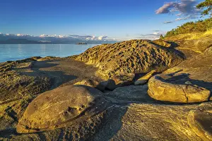 Sandstone: Weathered sandstone rock formations known as tafoni along the northeast shore of Gabriola Island