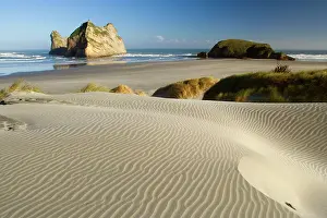 Wharariki: Wharariki Beach - white sand dunes of Whaririki Beach