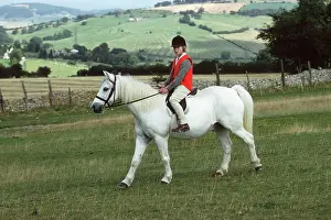 Exercising: White Horse - girl riding on Cleeve Hil