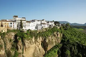 Towns: The White Town of Ronda high above the river gorge El Ta