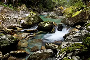 Alongside: Wildwater river - clear water running through a