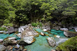 Alongside: Wildwater river - clear water running through a