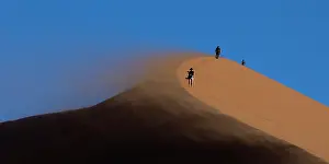 Blow: wind blow the sand from the edge of the dunes in Namib deser