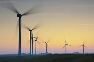 Generator: Wind Turbine generating power on a wind farm