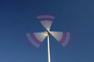 Generator: Wind Turbine generating power on a wind farm