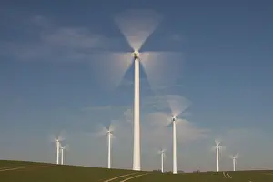 Generator: Wind Turbine generating power on a wind farm