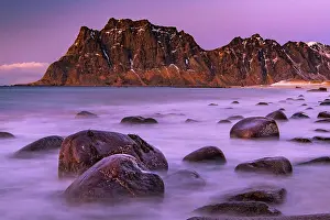 Uttakleiv: Winter coastal landscape with stormy sea, rocks