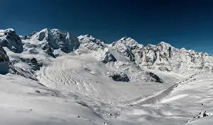 Moonlight: Winter mountain panorama on the Diavolezza at full