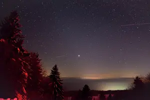 Trails: Winter sky - showing stars and airliner jet light trails