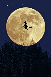 Hallowe En: Witch flying on broomstick past a full moon