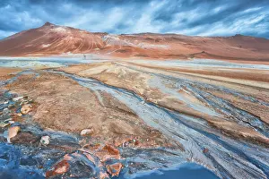 Thermal: Woman with photo tripod standing in the Hverir thermal