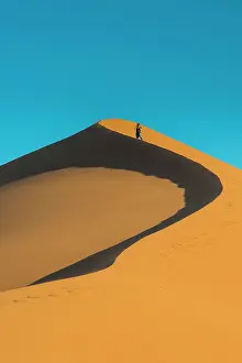 Naukluft: Woman on the the giant sanddune Dune 45, Namib-Naukluft