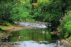 Pohnpei: Women washing in river Pohnpei Island