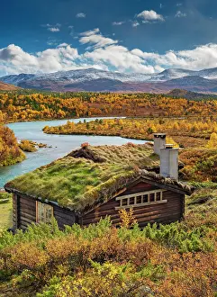 Situation: Wooden cabin, wide landscape, turquoise river, colorful